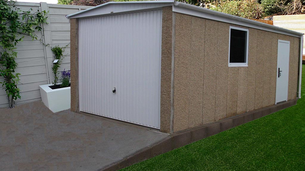 Modern Fairford Concrete garage with Interlocking concrete panels
